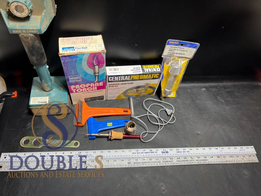 Tools and Accessories Including Ruler, Wrenches, and Utility Items