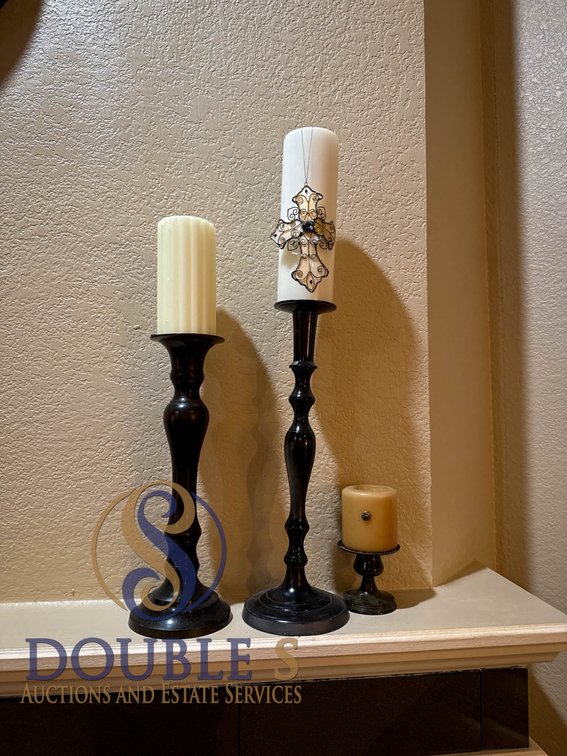 Three Metal Candle Holders in Varying Sizes