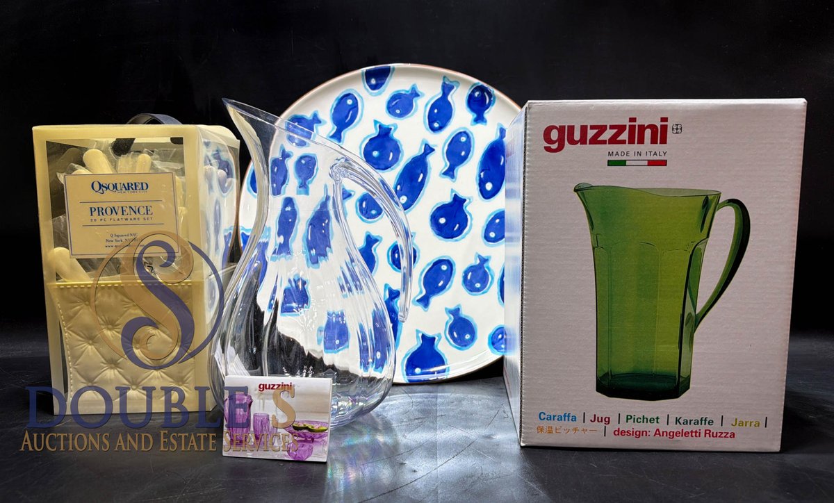 Serving Items Including Guzzini Pitcher, Q Squared Flatware, Glass Pitcher, and Ceramic Serving Platter