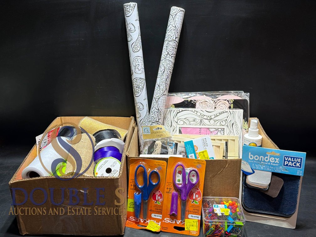 Crafting Supplies Including Ribbons, Scissors, Photo Mats, and Adhesives