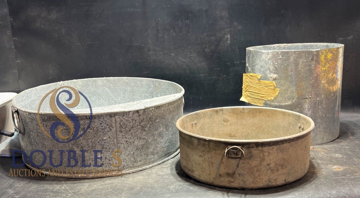 Three Metal Containers with Handles and Cylindrical Forms