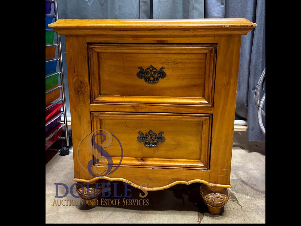 Two-Drawer Wooden Nightstand With Carved Details and Metal Hardware
