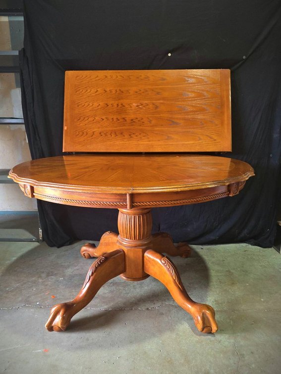 Round Oak Pedestal Dining Table with Leaf