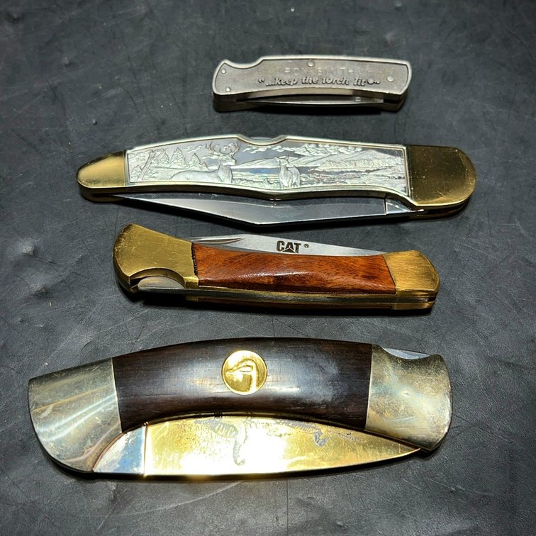 Four Collectible Pocket Knives Mixed Brands