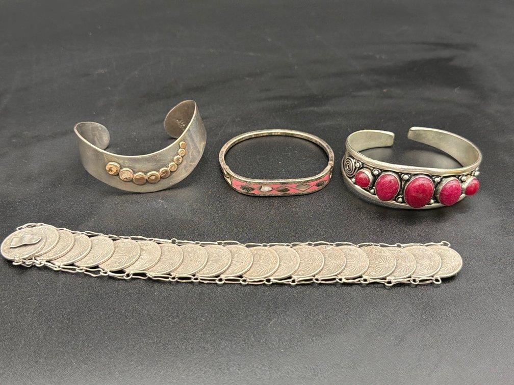 Four Metal Bracelets Assorted Styles and Designs