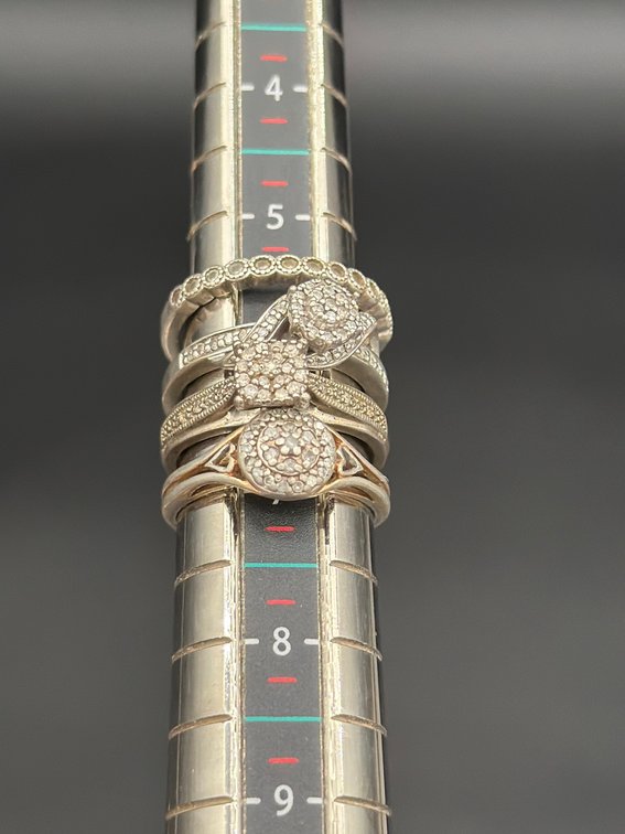 Four Sterling Silver Rings, Size 8