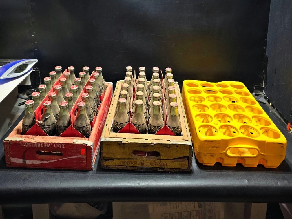 Coca-Cola Bottles with Wooden and Plastic Crates