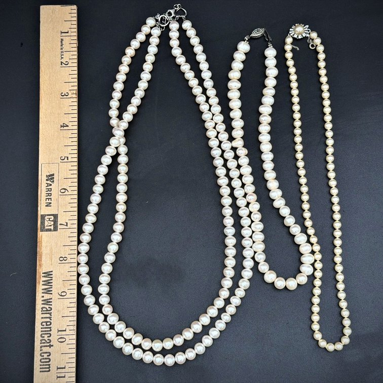 Three Pearl Necklaces with Varied Clasps
