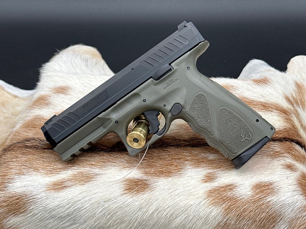 Taurus model TS9, 9mm pistol NIB with accesories