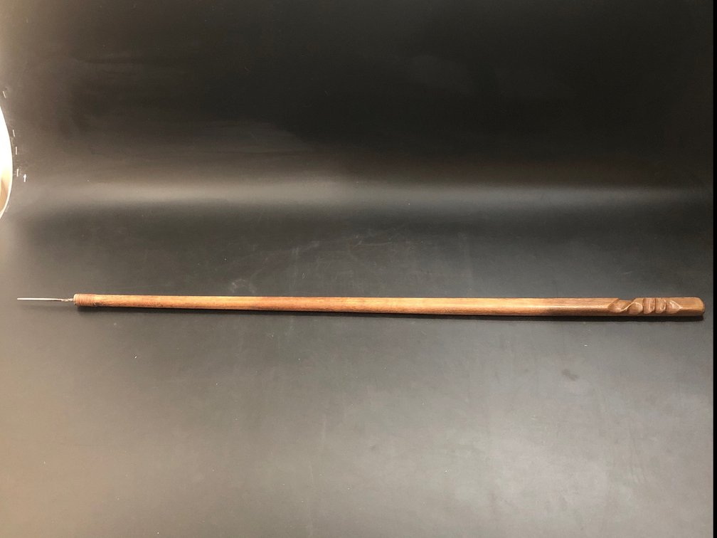 Primitive weapon with sharp spike 38”