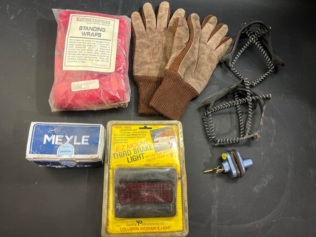 Standing wraps, work gloves, shoe traction grips, brake light, Meyle ball joint, and lock 