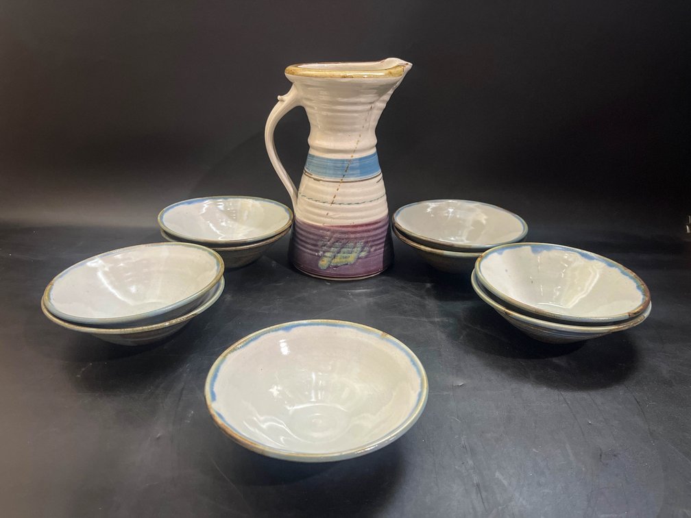 Blue Stoneware pitcher, and 9 bowls