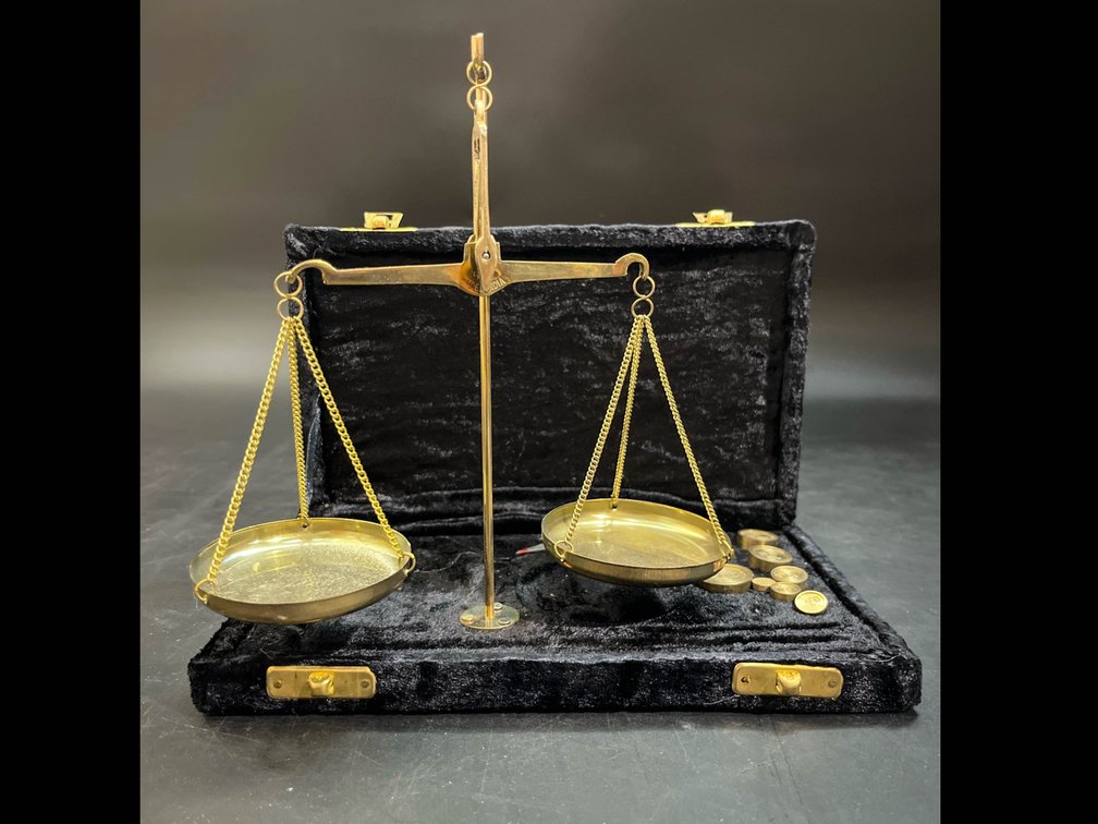 traditional goldsmith weight or apothecary scale