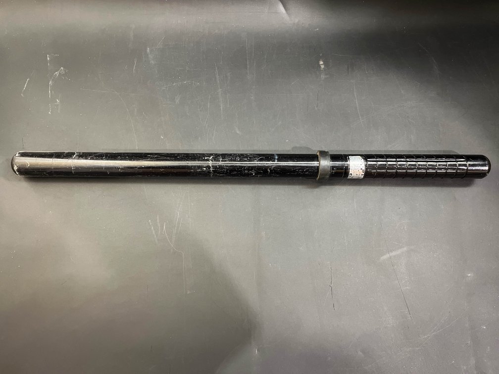 Metal night stick prop 