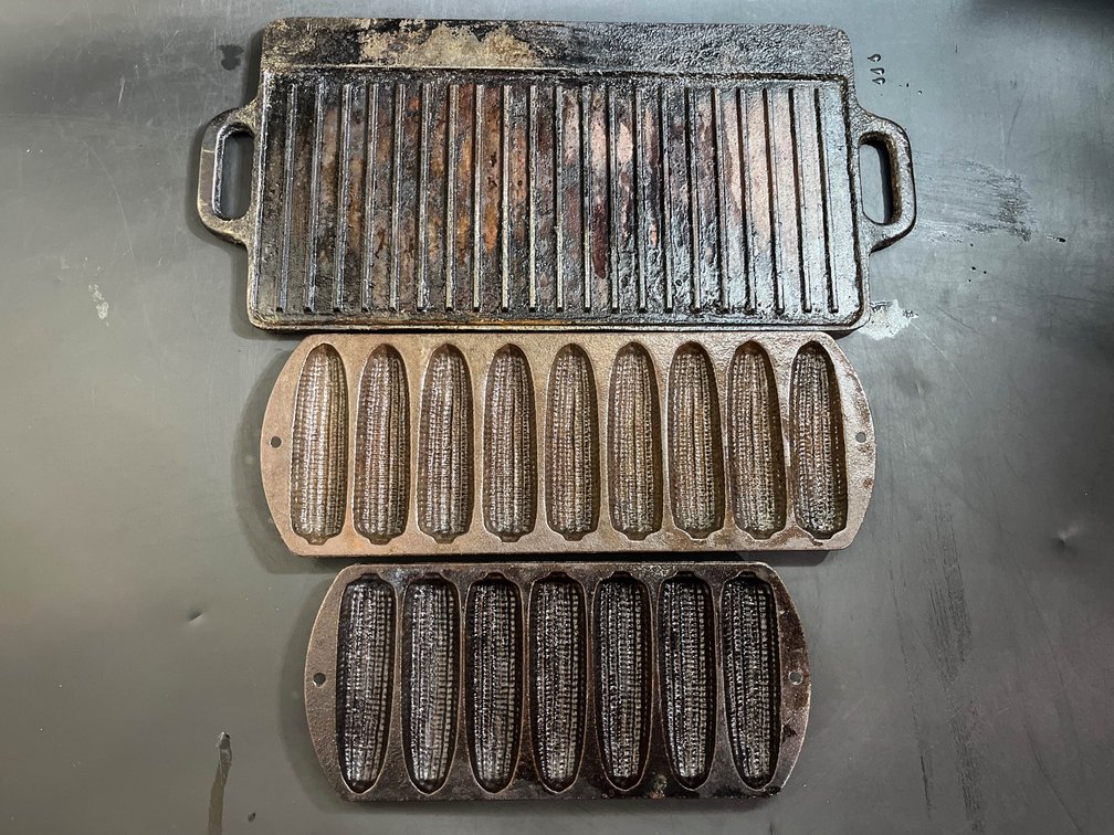 Cast iron Griddle and two cast iron corn bread pans