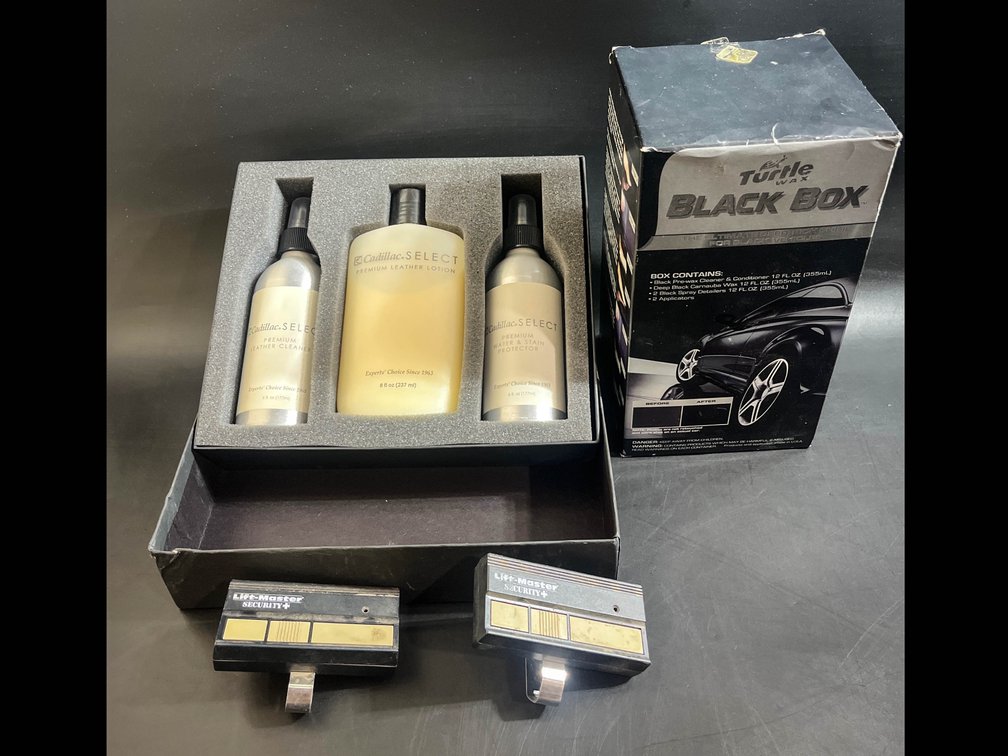 Cadillac select premium leather care kit, Turtle Wax black box, and Lift Master Security