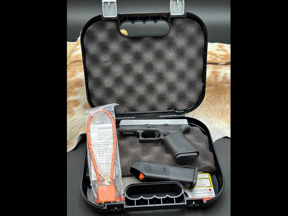 Glock 43X two-tone Ameriglo with night sights in original box,  9 mm luger, 2 Mags, lock and paperwork