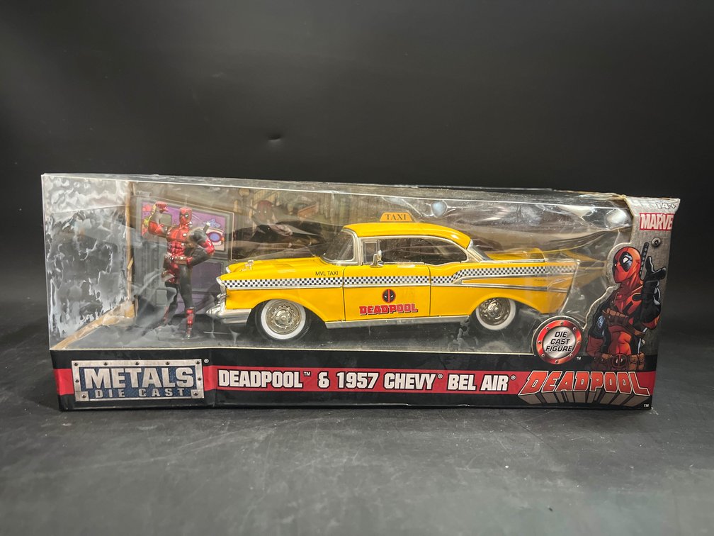 1957 Chevrolet Bel Air Taxi Yellow with Deadpool Diecast Figurine