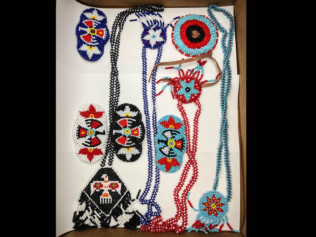 Native Menominee artisan made necklaces and Hairclips with thunderbird design, and 