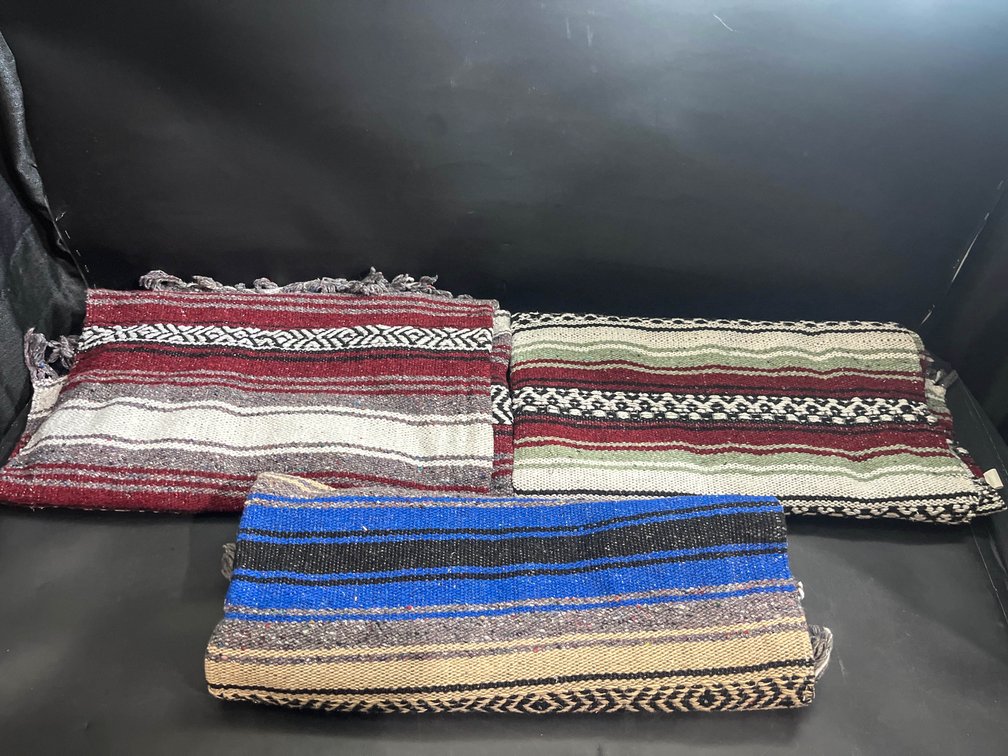 Three throw blankets 