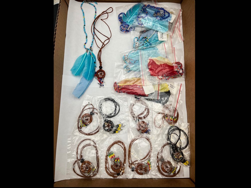 Artisan made beaded feather necklaces and dream catcher necklaces