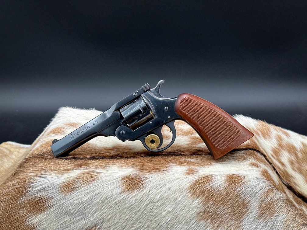 H&R Arms 38 S&W Defender break open revolver.  Made in WWII