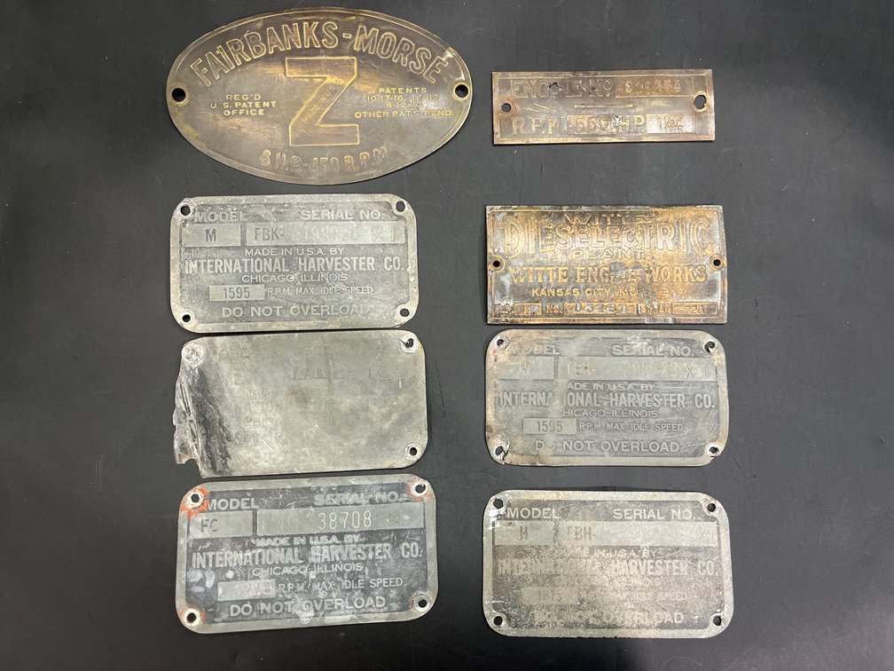 collection of vintage identification plates