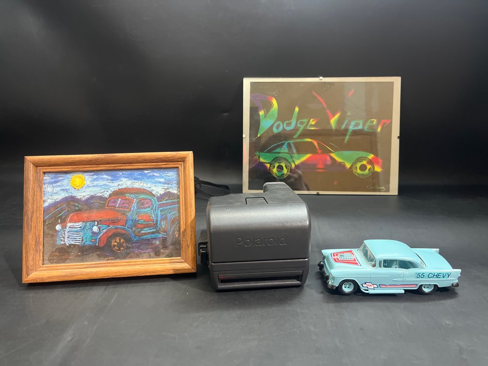 Polaroid camera, Dodge Viper framed art piece 12”x9”, framed truck art 8”x6”, 55 