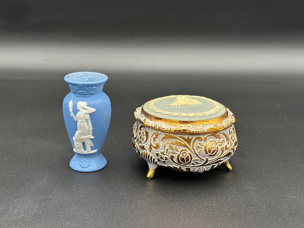 German Jasperware Vase Adorned with a white bas-relief figure