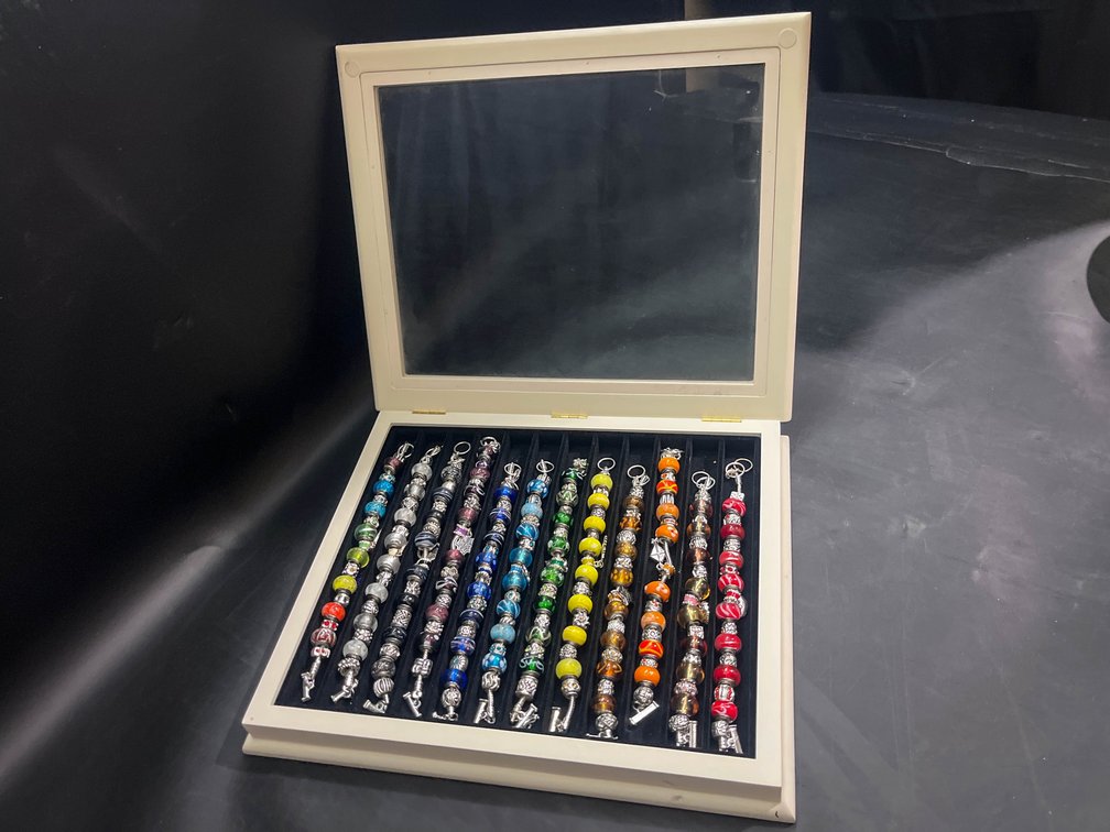 Charm bracelets in jewelry box 