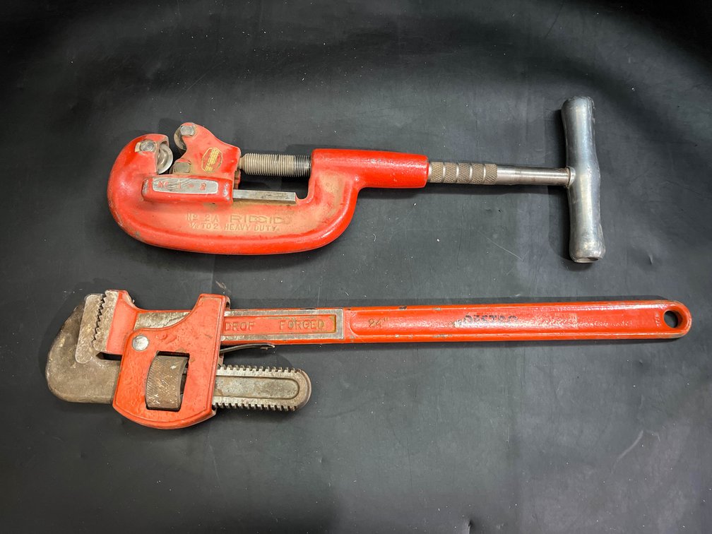 24” heavy-duty straight pipe wrench, and Rigid pipe cutter