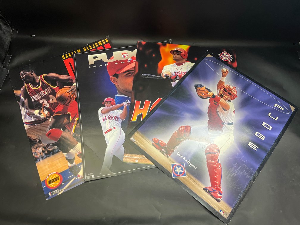 Sports memorabilia posters Ivan Rodriguez and Hakeem Olajuwon 