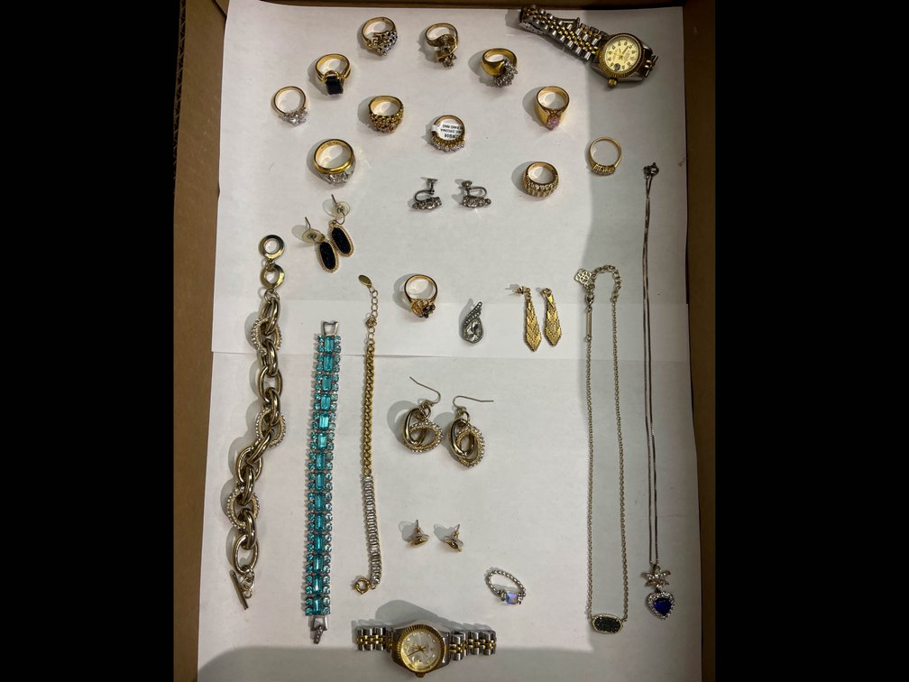Assorted Jewelry Collection Including Rings, Necklaces, and Watch