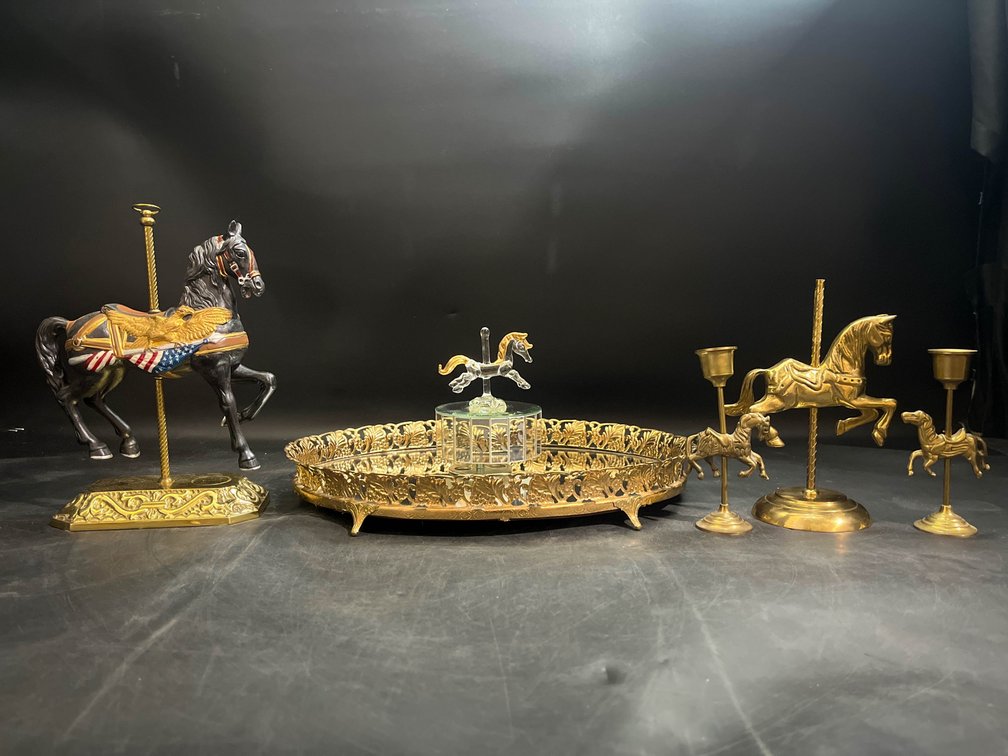 Mirrored Vanity tray, carousel music box, figurines, and candle holders