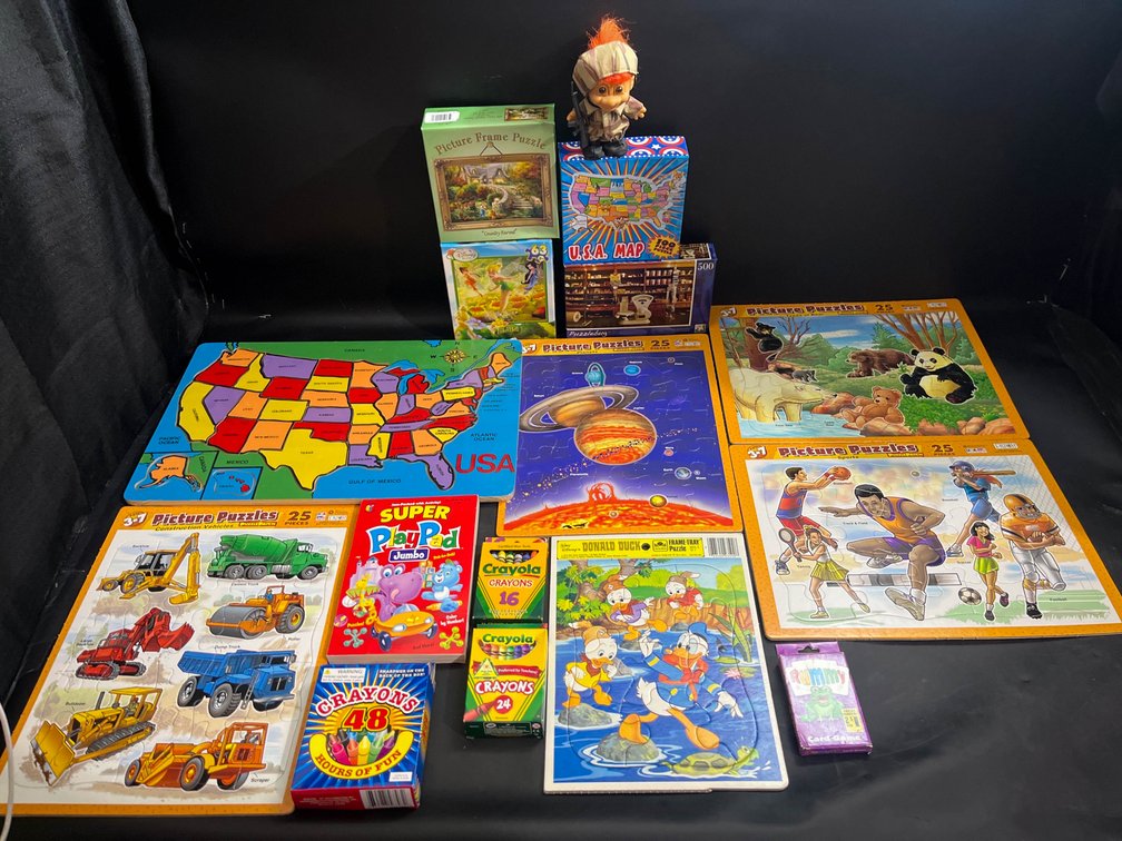 Puzzles, crayons, activity book, and more