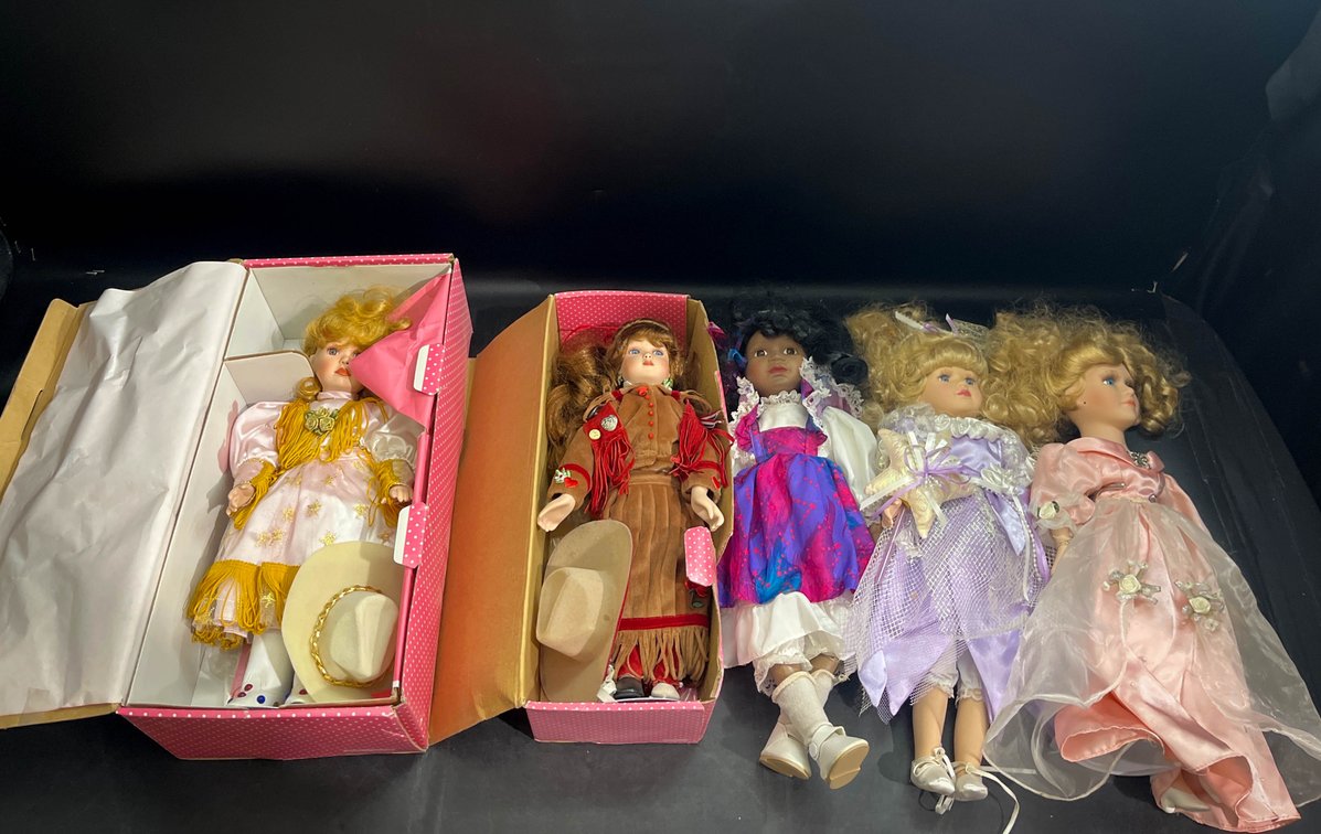 Five porcelain dolls