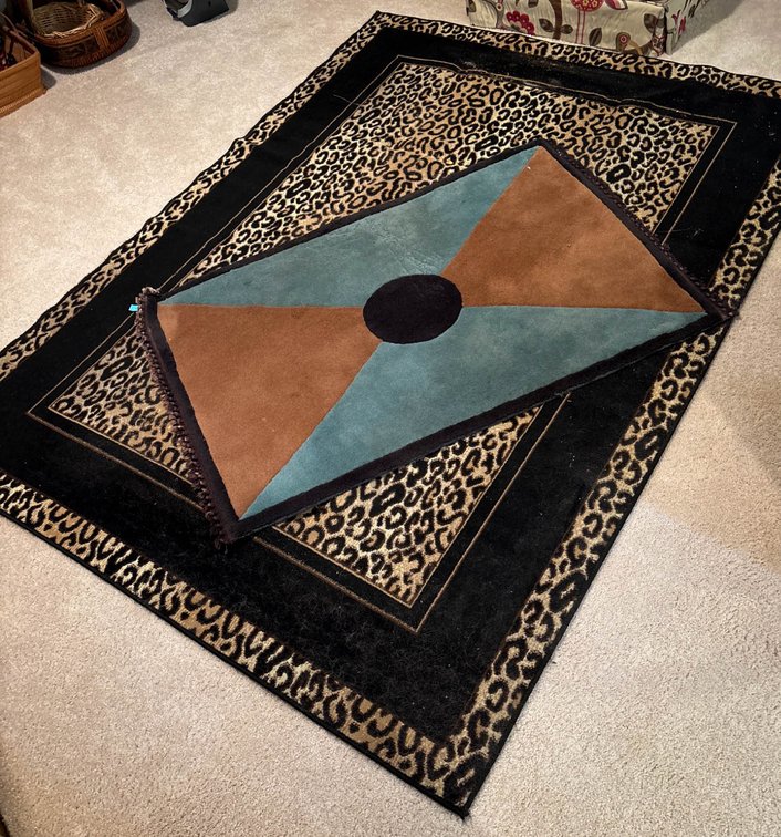 Two Decorative Area Rugs Featuring Leopard Print and Geometric Design
