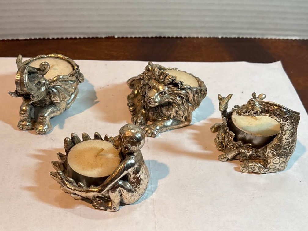 Four Animal-Themed Candle Holders in Metallic Finish