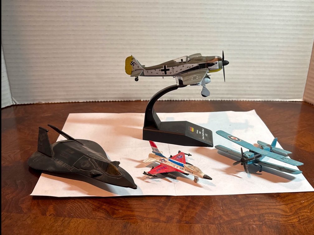 Four Model Airplanes with Display Stand