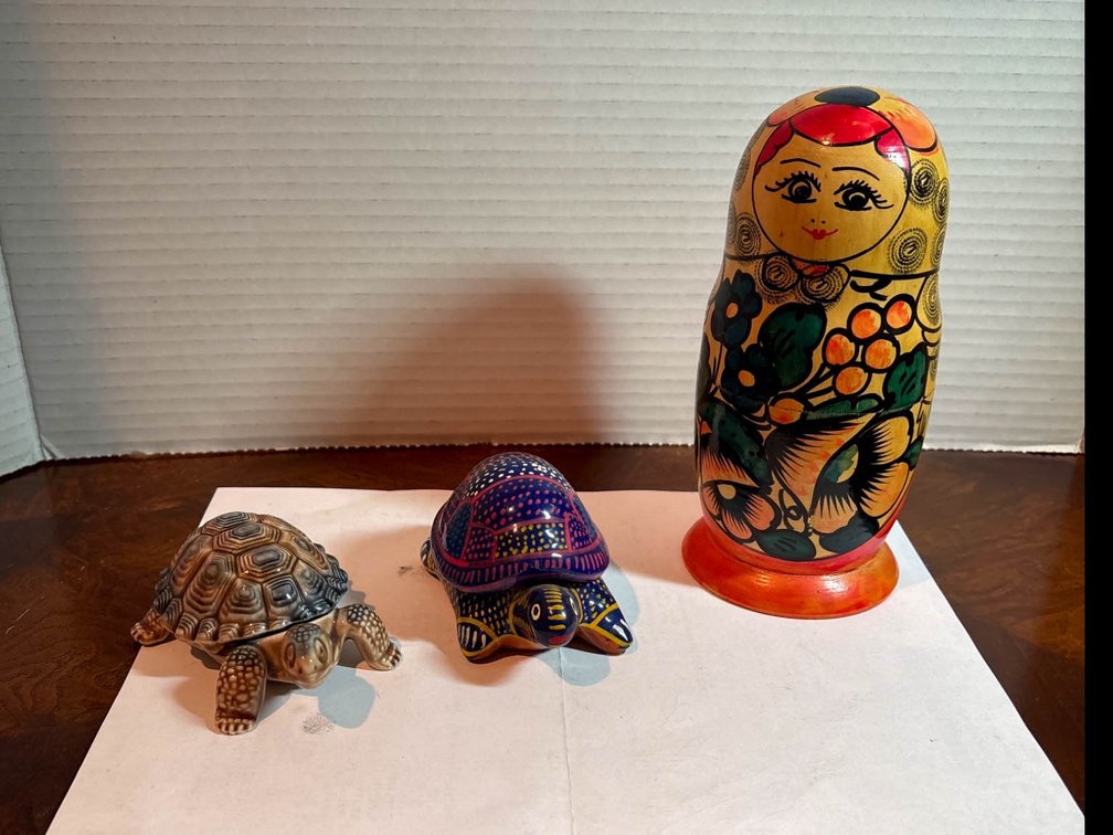 Matryoshka Nesting Dolls and Decorative Turtle Figurines