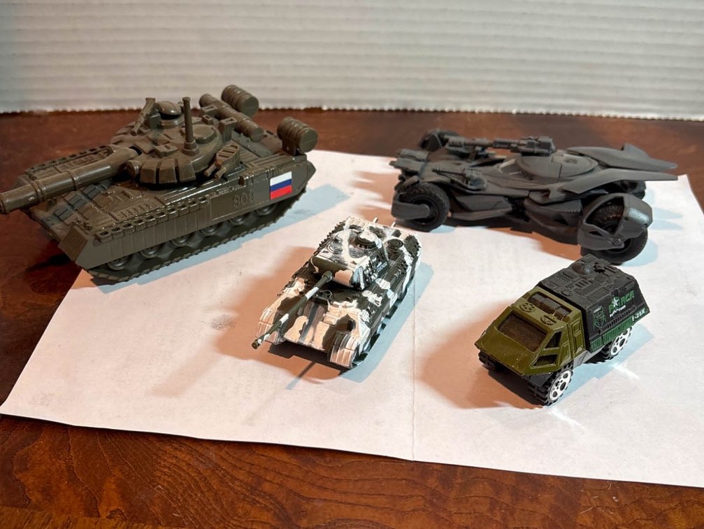 Four Collectible Model Vehicles Including Tanks, Armored Car, and Batmobile