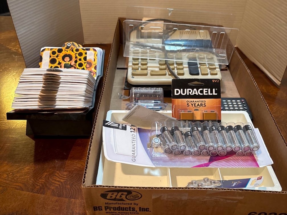 Office Supplies Including Calculator, Batteries, and Index Cards