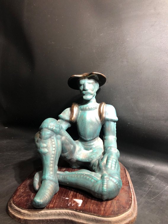 Bronze-Colored Figurine of a Resting Armored Man on Wooden Base