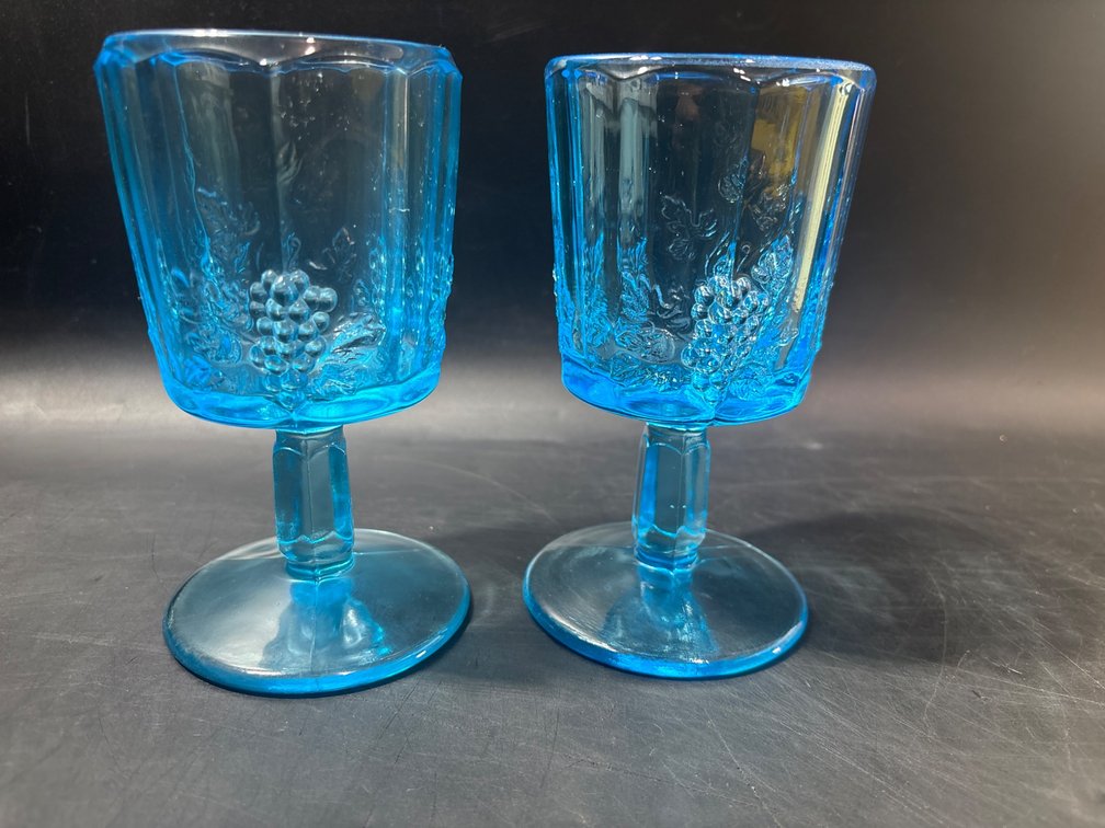 Two Blue Pressed Glass Goblets with UV Reactive Glow