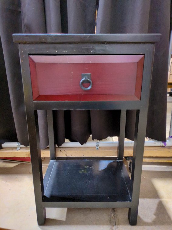 Black and Red Wooden End Table With Single Drawer and Lower Shelf