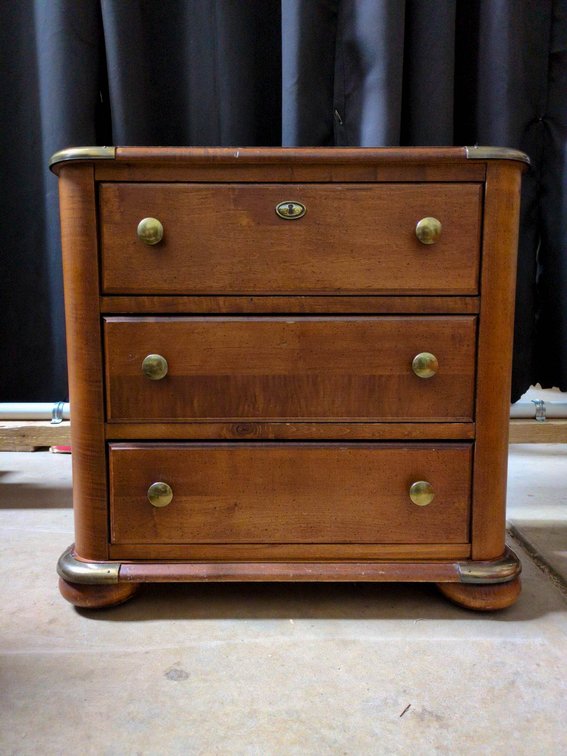Wooden Three-Drawer Chest With Brass Accents