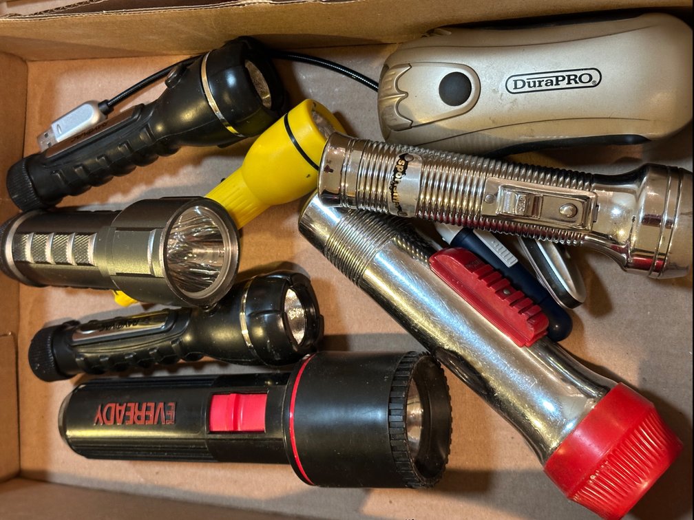 Seven Flashlights in Various Styles and Sizes