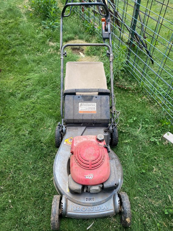 Honda Push Mower and Standard 3 Gallon Oil Can