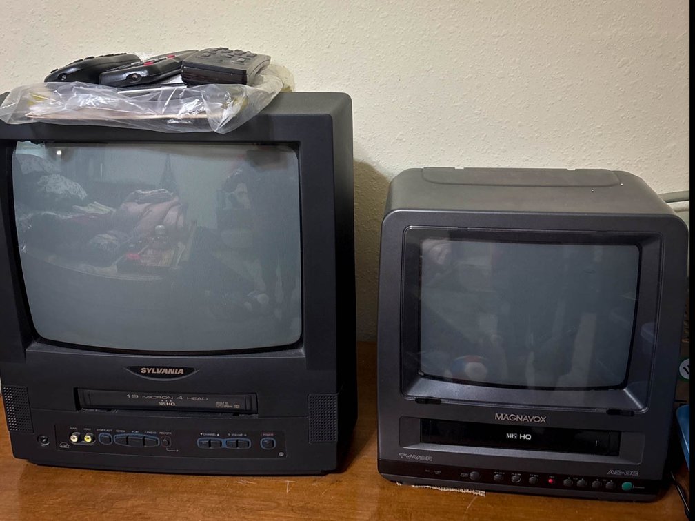Two CRT TVs with Built-in VHS Players and Remotes