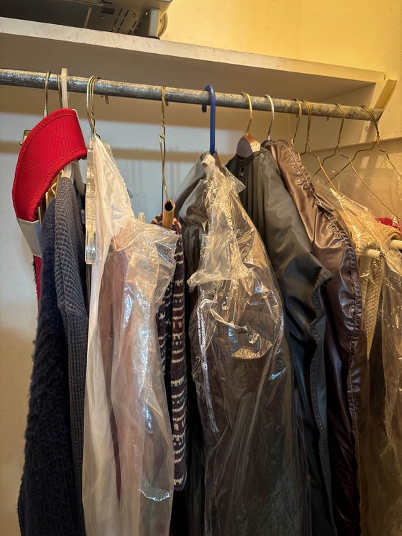 Garments Including Pendleton Jacket and Hanging Sweaters